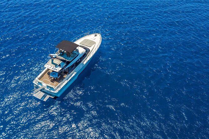 Half-Day Private Yacht Cruise in Rhodes - Sailing east: the view build toward Anthony Quinn Bay
